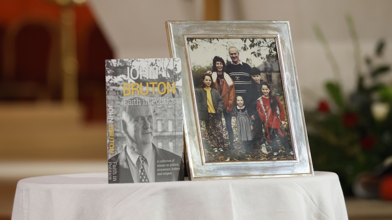 Gifts brought to the altar included a copy of John Bruton's book 'Faith in Politics' and a picture of him and his family when his children were young