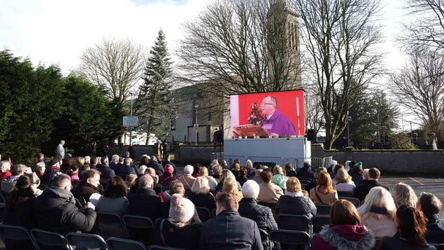 Hundreds of people watch proceedings in Dunboyne from outside the church