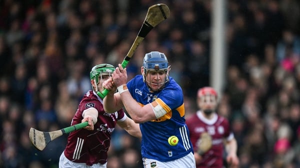 Alan Tynan of Tipperary is tackled by Galway's Jack Grealish