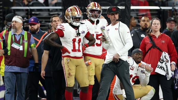 Kyle Shanahan patrols the sideline at Allegiant Stadium