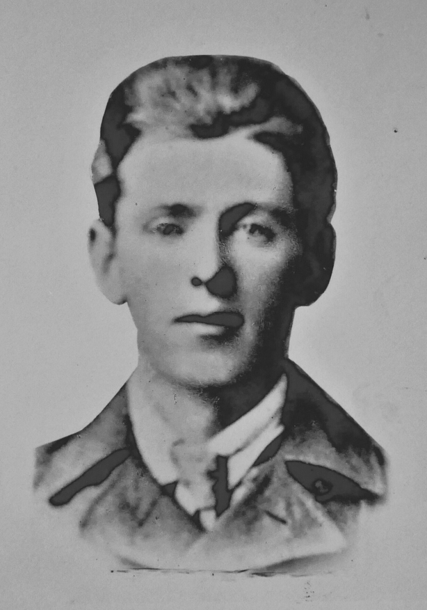 Black and white photo of young man