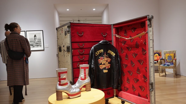 Elton John's personal items sell for $8m at auction