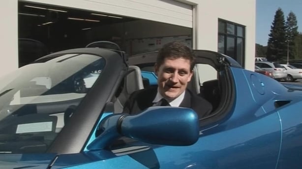 Minister Eamon Ryan takes the Tesla Roadster for a test run, 2009