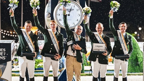 Shane Sweetnam, Daniel Coyle, team manager Michael Blake, Cian O'Connor and Darragh Kenny on the podium. (Pic: Morgan Froment)