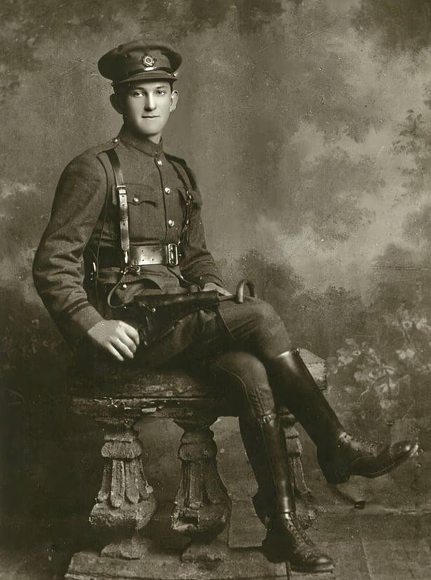 A sepia photo of a young man in uniform