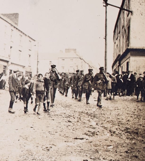 Soldiers and young boys in 1922