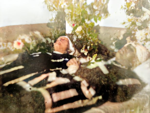 Colourised photo of the O'Connor Scarteen brothers in their coffins