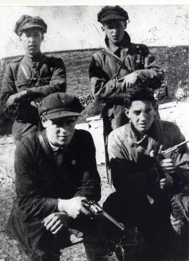 Four young IRA men in flat caps credits to Aiden Redmond Westport