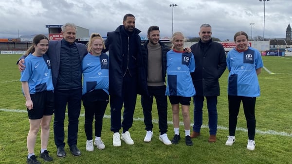 Young participants in the project with Rio Ferdinand and Shane Filan (C), Paddy Harte (L) and Minister Dara Calleary (R)