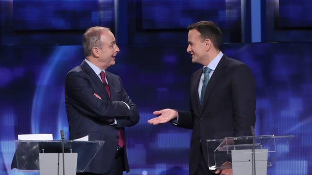 Micheál Martin and Leo Varadkar talk at the final TV leaders' debate at the RTÉ studios in Donnybrook, Dublin ahead of the 2020 General Election