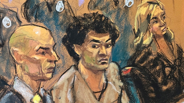 A court sketch shows Sam Bankman-Fried sitting between his defence attorneys Marc Mukasey and Torrey Young during his sentencing hearing