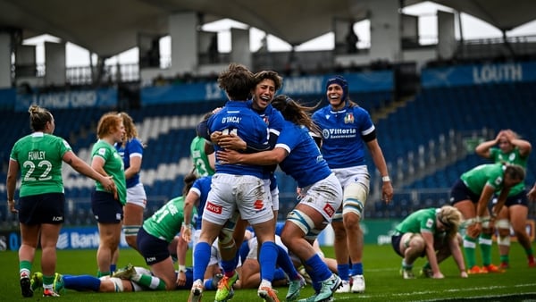 Italy's players react at the full-time whistle at the RDS