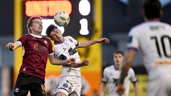 Galway's David Hurley fights for possession against James McManus