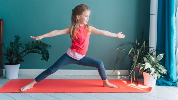 Not only are children developing coordination, flexibility and body awareness, yoga allows children to tap into the natural world. Photo: Getty Images