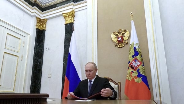 Russian President Vladimir Putin chairs a security meeting via a videoconference in Moscow on April 5, 2024