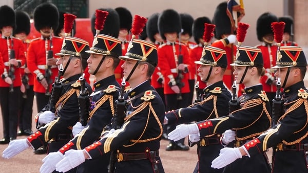 Members of France's Gendarmerie Garde Republicaine and members of the British Army's F Company Scots Guards take part in a special Changing of the Guard ceremony at Buckingham Palace