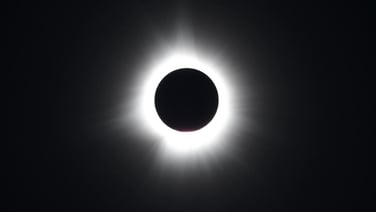 Gasps of astonishment, cheers and applause greet the solar eclipse in Houlton, Maine.