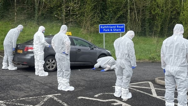 Forensic examiners at the scene of the attack
