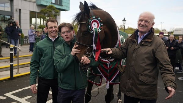 Jockey Paul Townend, left, groom Steven Cahill, centre, Grand National winner I Am Maximus and trainer Willie Mullins, right, in Leighlinbridge, Co Carlow