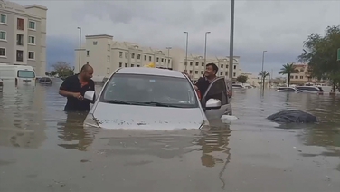 Cars submerged in floodwater following torrential rain in Dubai