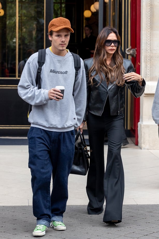 Victoria Beckham (R) and son Cruz Beckham are seen on September 30, 2023