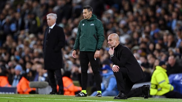 Pep Guardiola looks on during the penalty shootout