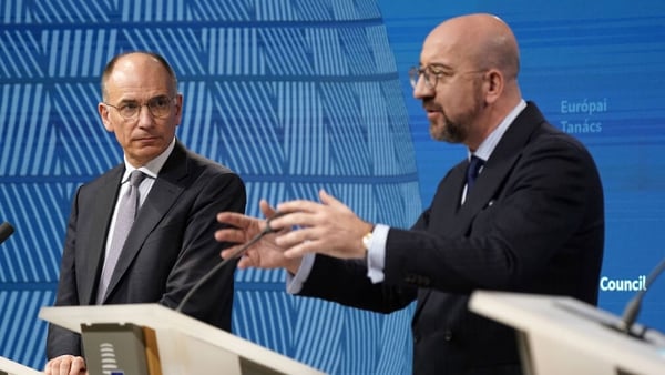 Former Italian prime minister Enrico Letta (L), pictured with European Council President Charles Michel, delivered a report to EU leaders