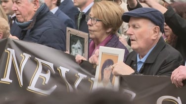 Family members of Stardust victims walk to Garden of Remembrance
