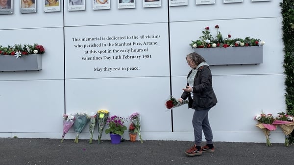 A number of people travelled to the Stardust Memorial at the site of the fire to leave flowers