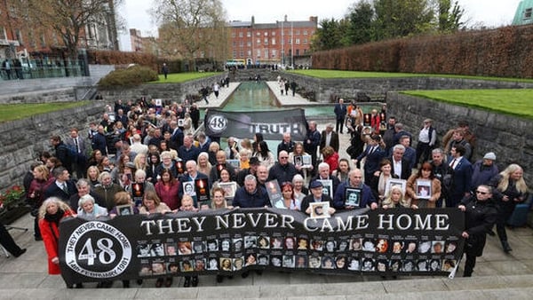 Family members of the Stardust victims pictured in the Garden of Remembrance after the verdicts were delivered (Pic: RollingNews.ie)