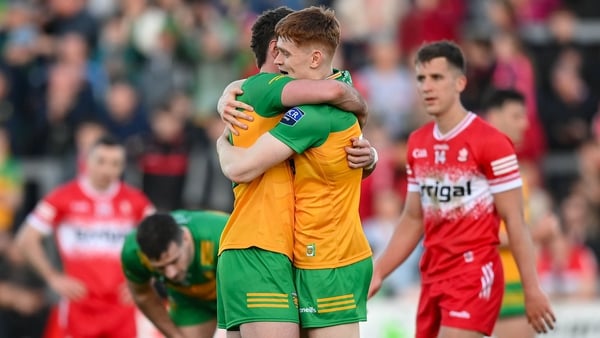 Daire Ó Baoill, left, and Ciaran Moore of Donegal celebrate after beating Derry to a book an Ulster semi-final spot
