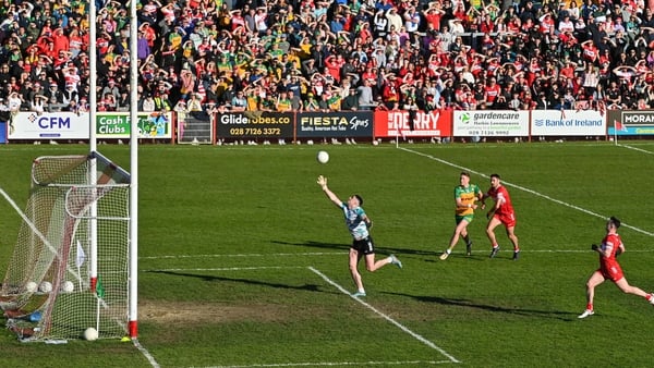 Derry goalkeeper Odhran Lynch is lobbed by Daire Ó Baoill's for Donegal's first goal