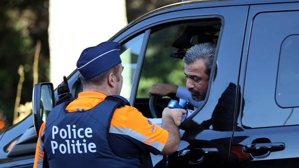 A policeman gives a driver a breathalyser test in Brussels, Belgium (file image)