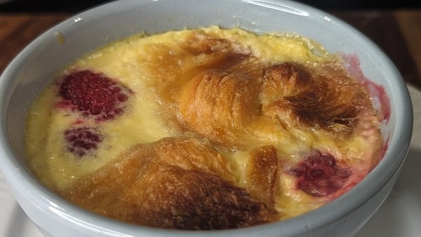 Sweet and fluffy, with bursts of freshness from the raspberries, this croissant pudding is a pure delight.