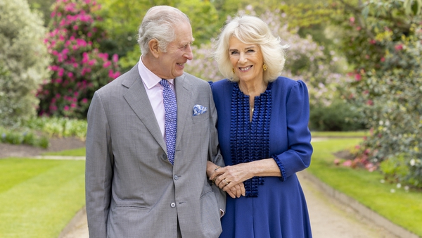 King Charles and Queen Camilla pictured in the gardens of Buckingham Palace earlier this month