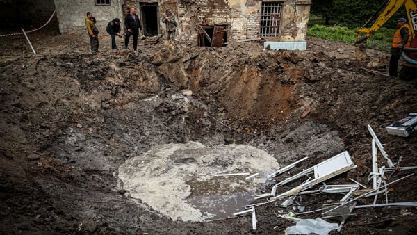 A sinkhole, pictured today, from a Russian missile that hit the city of Kharkiv