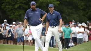McIlroy and Lowry share third ahead of final round