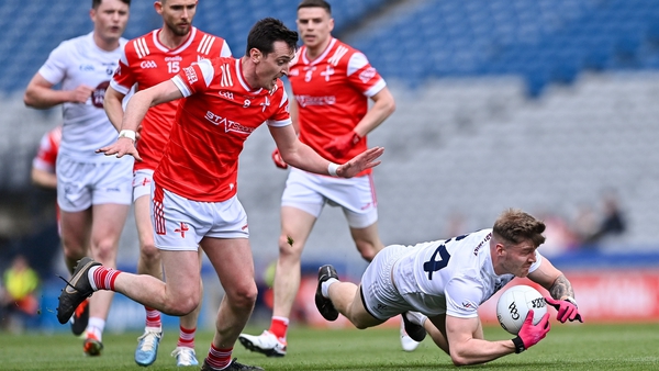 Kevin O'Callaghan of Kildare in action against Louth's Tommy Durnin