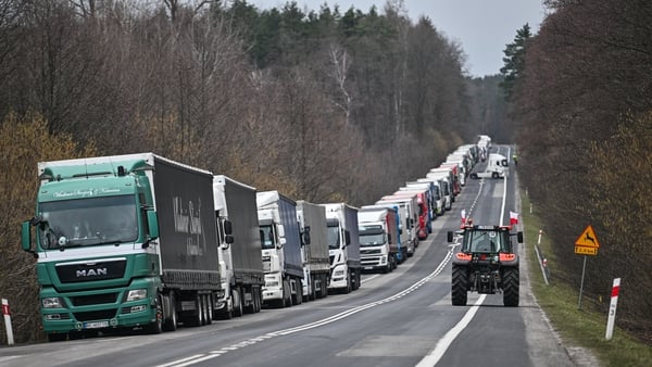 Ukrainian truck drivers wait in line as Polish farmers blockaded Poland's border with Ukrainian earlier this year