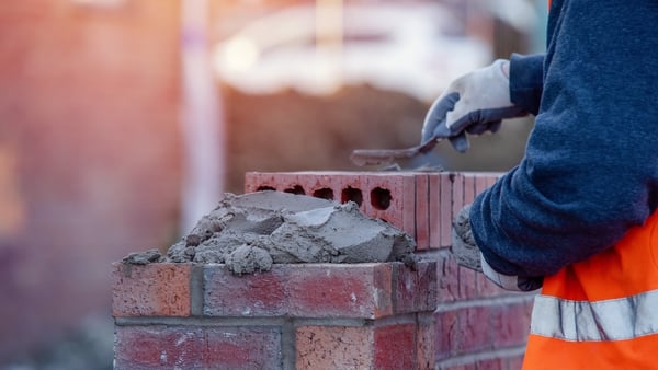Builders were renovating a hotel when a group of 30 people told them to 'get out' (stock image)