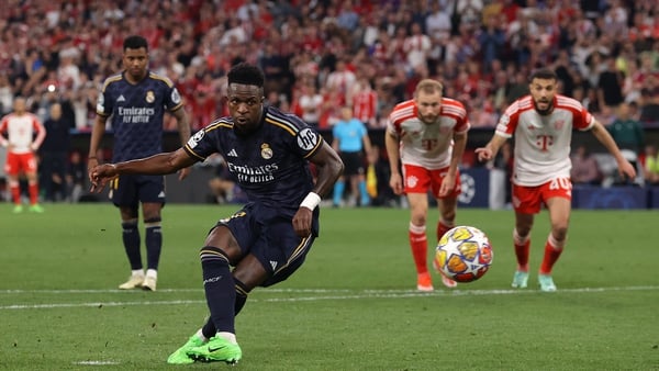 Vinicius Junior tucks away a penalty to equalise for Real Madrid