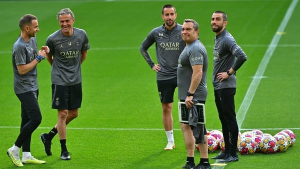 Paris Saint-Germain's Spanish head coach Luis Enrique and his staff at the Signal Iduna Stadium in Dortmund