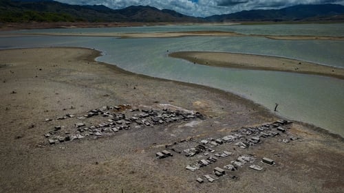 The dried-up dam has revealed parts of a sunken church and old structures