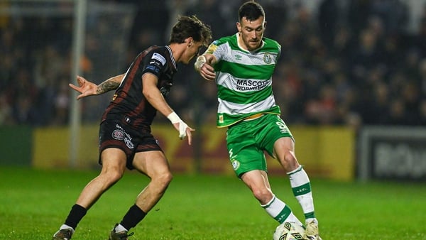 Aaron Greene of Shamrock Rovers tries to get past Dylan Connolly