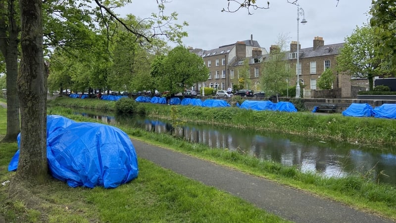 Asylum seekers pitch over 70 tents alongside Dublin's Grand Canal