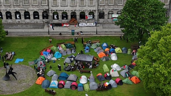 Students taking part in an encampment protest over the Gaza conflict on the grounds of Trinity College