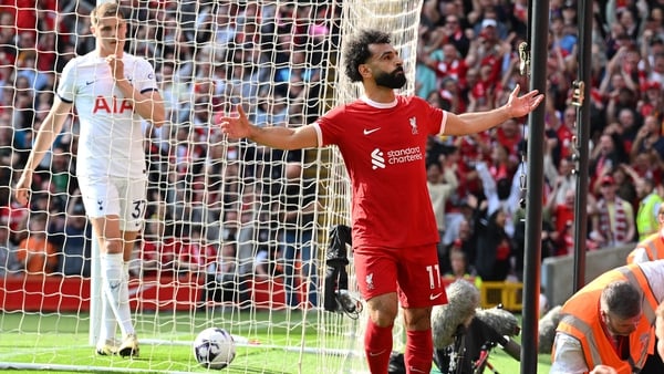 Mo Salah celebrates after opening the scoring against Spurs