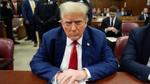 US judge warns Trump of prison for violating gag order
