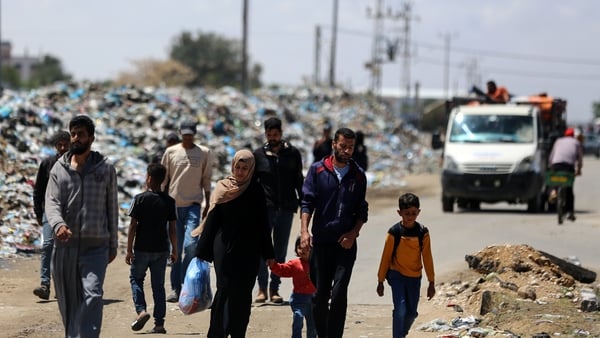 Displaced Palestinians arriving in Khan Yunis with their belongings from Rafah in southern Gaza
