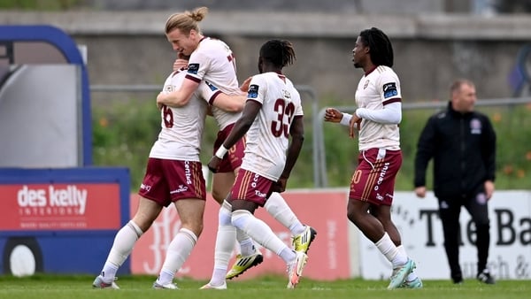 Maurice Nugent is mobbed after netting for Galway United